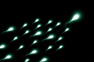 foto di spermatozoi con sfondo nero per spiegare l'azoospermia
